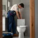 Clogged toilet illustrating common reasons a toilet keeps clogging, including excessive toilet paper, foreign objects, and drain blockages.